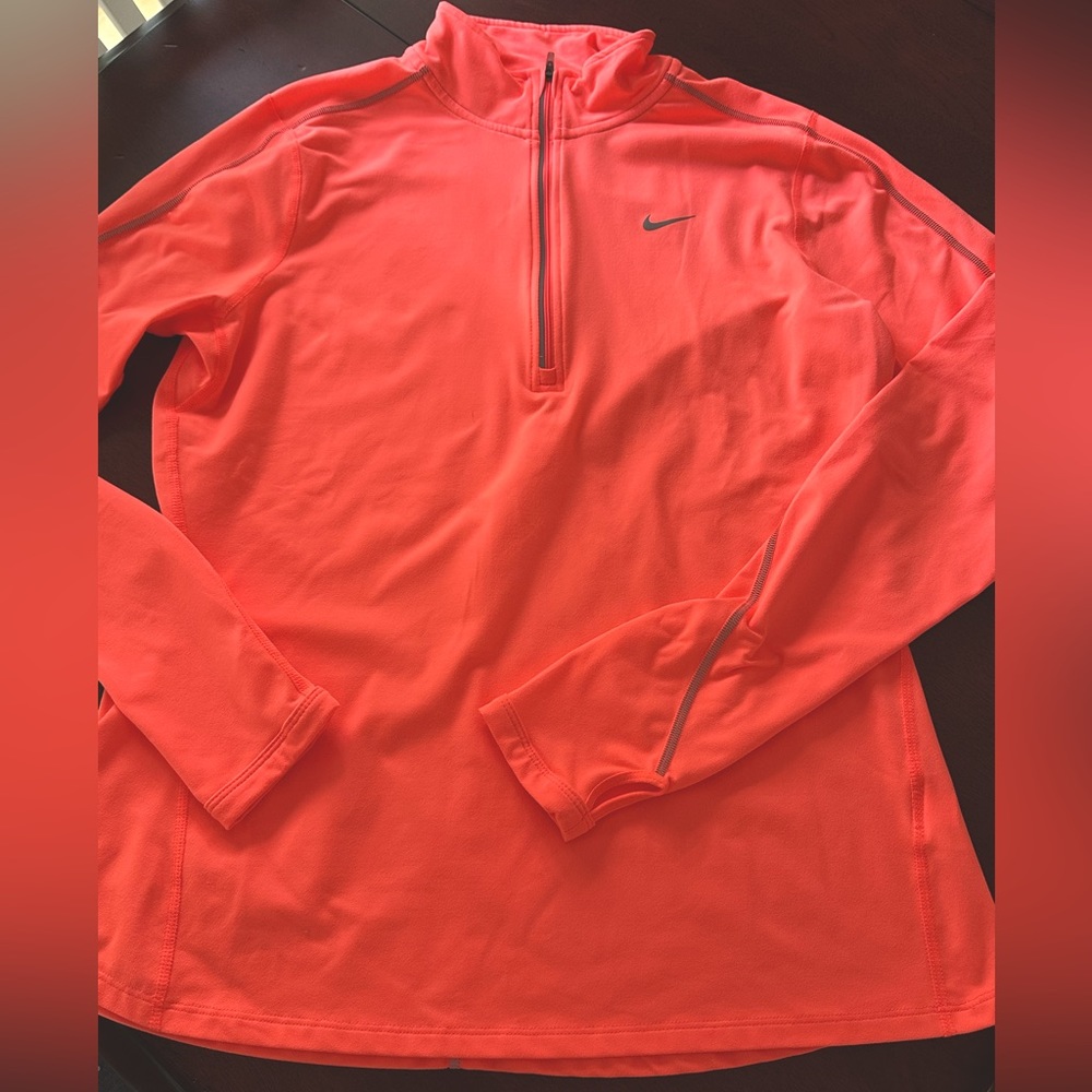 Ladies Nike running 3/4 zip top w/reflective stitching & thumb loops size Large